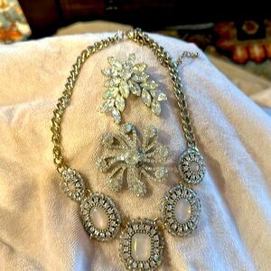 3 separate pieces. A collection of 2 brooches and 1 necklace. In Rhinestone